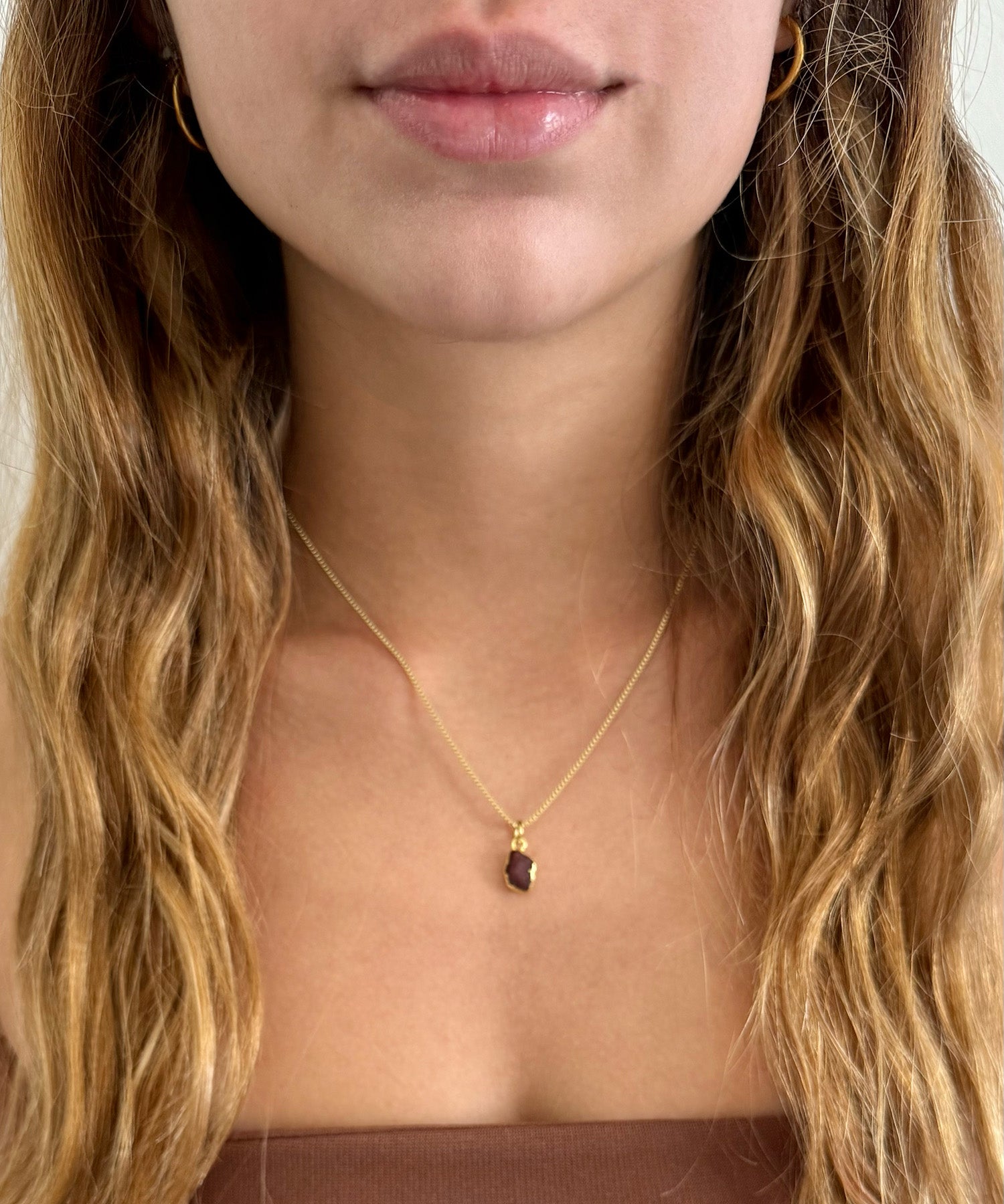 THE CANCERIAN NECKLACE WITH RUBY