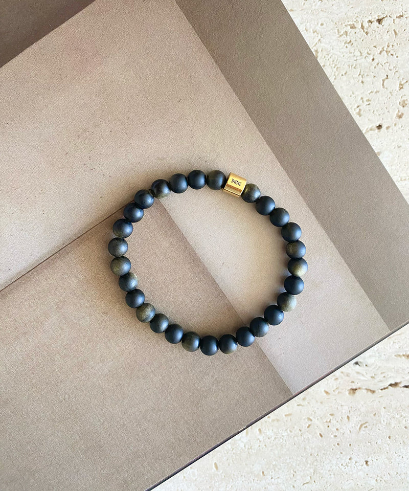 THE RESILIENCE BRACELET WITH GOLDEN OBSIDIAN & HELIX TALISMAN