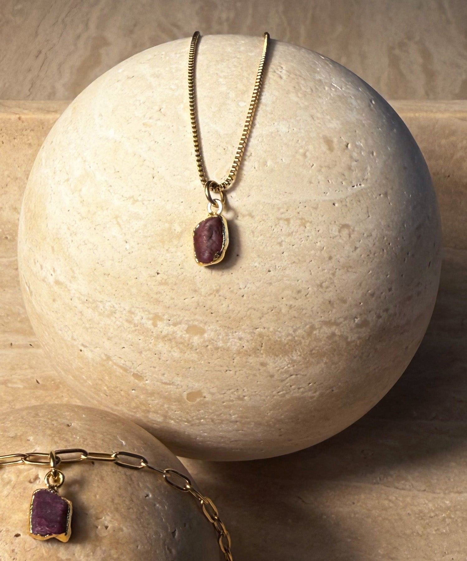 THE CANCERIAN NECKLACE WITH RUBY